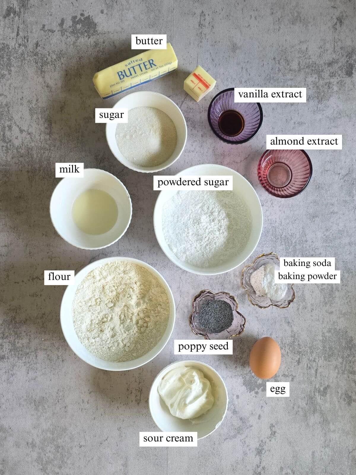 Labeled ingredients for almond poppy seed scones with almond glaze.