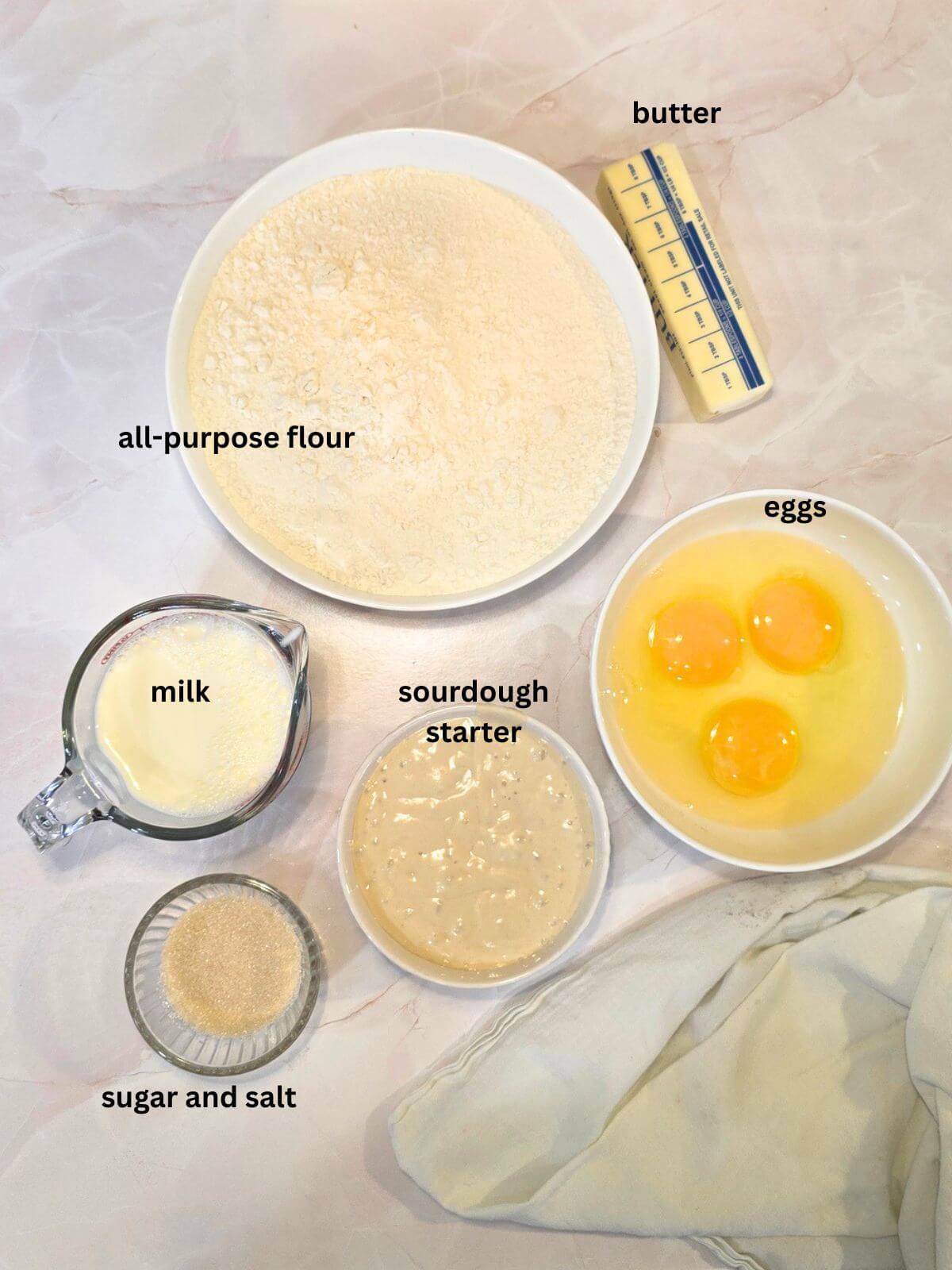 Ingredients for sourdough hoagie rolls.